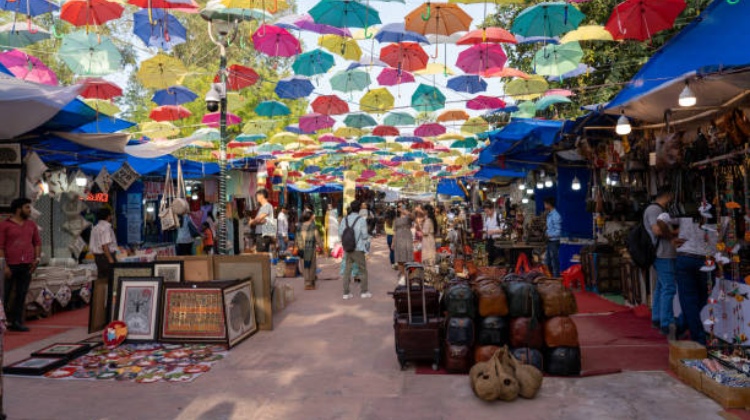 "Discover the cultural hub of Dilli Haat in Delhi, a top attraction in New Delhi, steeped in history. Your ultimate Delhi travel guide awaits"