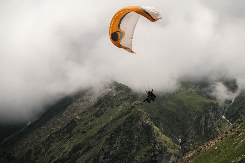 Paragliding in Uttarakhand: Explore Nainital, Mussoorie, and top places during the best paragliding season for an unforgettable experience.