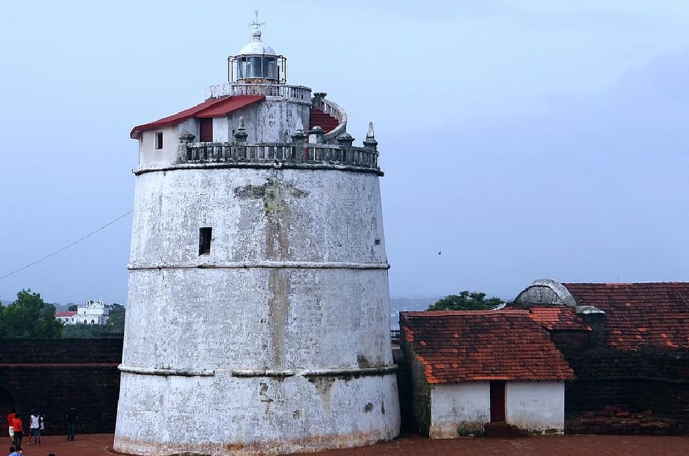 Aguada Fort in Goa, address, location, information, and nightlife details, overlooking the sea.