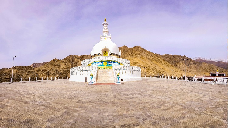 Breathtaking view of the majestic mountains in Leh Ladakh, with a guide on How To Reach Leh Ladakh, insights on the Best Time To Visit Leh Ladakh, and highlights from a memorable Leh Ladakh Tour.